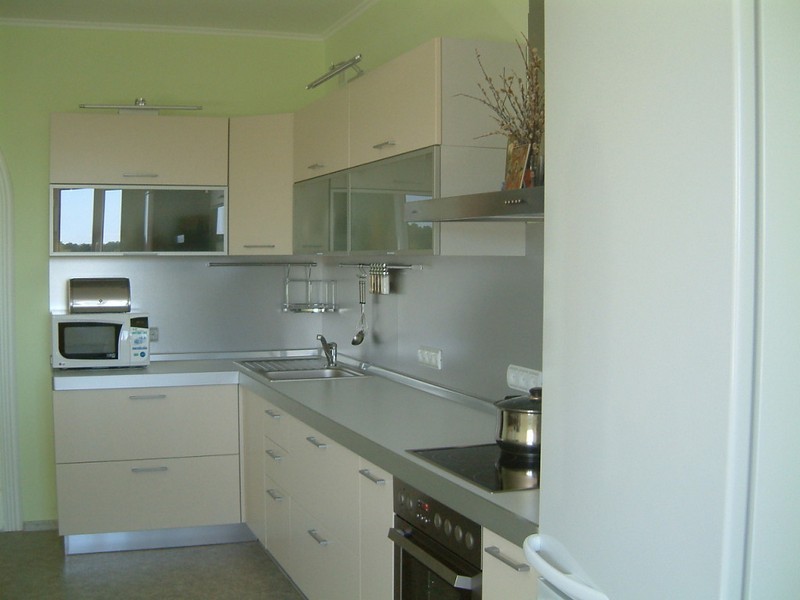 Oświetlenie z Klimatem Wielopoziomowe oświetlenie kuchni 2026: połączenie funkcjonalności i przytulnej atmosfery.