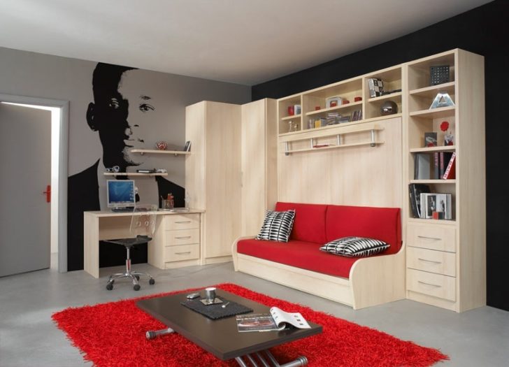 Oszczędność miejsca, funkcjonalność Wielofunkcyjna sofa transformująca wbudowana w meble oszczędza miejsce w pokoju dziecięcym.