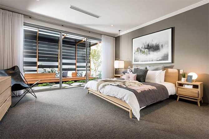 Minimalizm w szarości Nowoczesny dom styl 2026: minimalistyczne wnętrze z szarymi odcieniami i dużymi przeszkleniami.