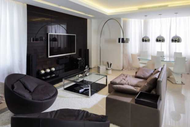 Apartament z widokiem Eleganckie wnętrze apartamentu z panoramicznym oknem i nowoczesnymi meblami.