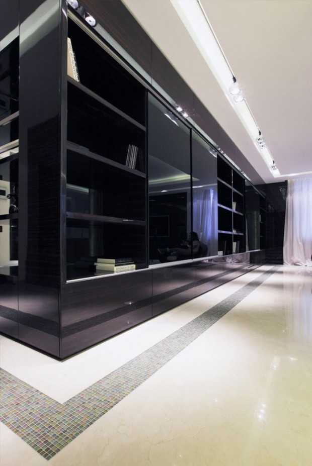 Kuchnia w penthousie Funkcjonalny aneks kuchenny z wyspą w nowoczesnym apartamencie typu penthouse.