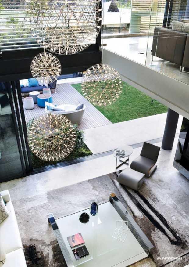 Innowacyjne rozwiązania Design high-tech: Nowoczesny dom w Johannesburgu z innowacyjnymi rozwiązaniami architektonicznymi i szklanymi panelami.