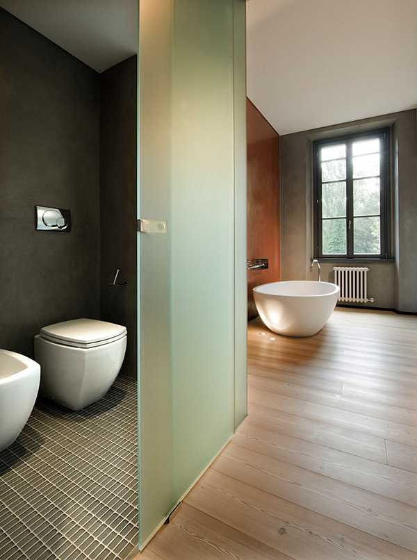 Rustykalna włoska jadalnia Tradycyjny włoski design: rustykalna jadalnia z drewnianym stołem i krzesłami w ciepłych kolorach.