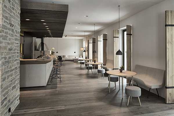 Luksus w Wiesergut Hotel Wiesergut: Luksusowy pokój z drewnianą podłogą i minimalistycznym wystrojem wnętrz w Austrii.