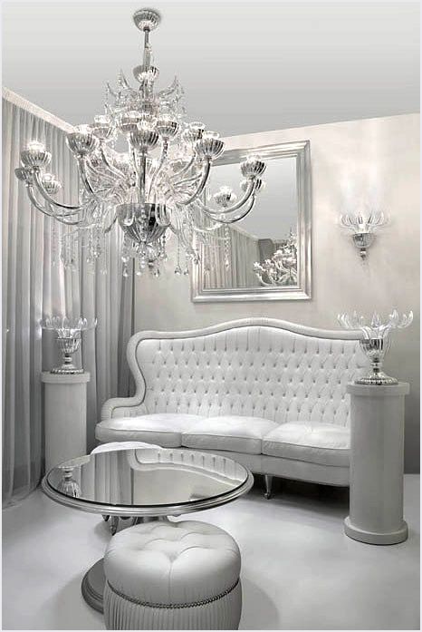 Żyrandol: Twoje wymarzone oświetlenie Elegancki żyrandol w salonie, idealny do oświetlenia wielopoziomowego i stworzenia przytulnej atmosfery w domu.