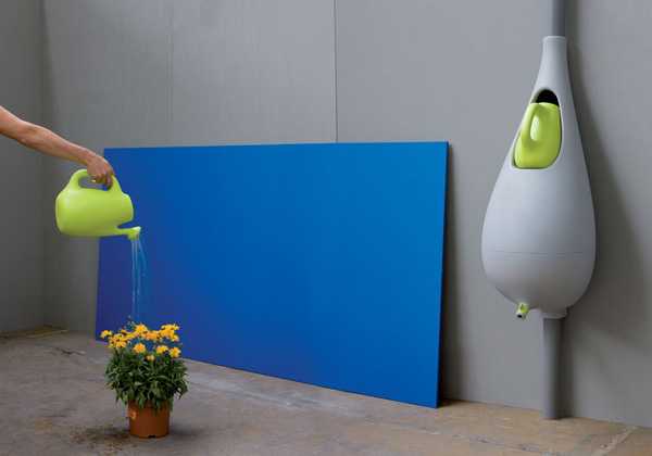 Rynna w małym ogrodzie Rynny zbierające wodę deszczową: praktyczne i dekoracyjne rozwiązanie dla małego ogrodu.