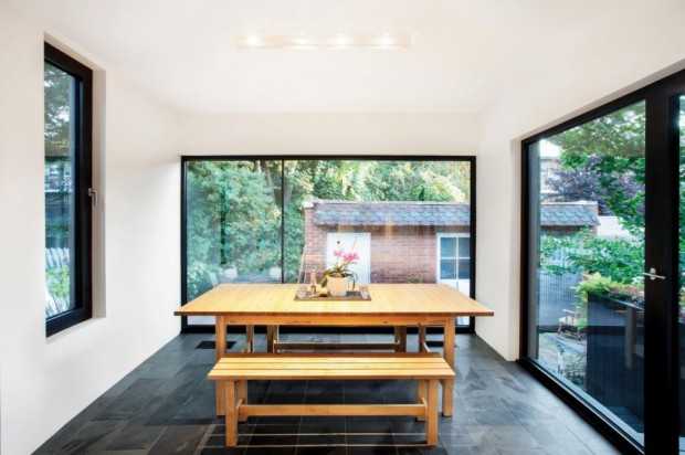 Minimalizm z Drewnem Projekt rozbudowy starego domu w stylu minimalizmu 2026 z drewnem.