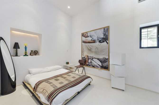 Ibizańska Trzecia Sypialnia Trzecia sypialnia w willi na Ibizie: minimalistyczny design inspirowany tradycją i stylem 2026.