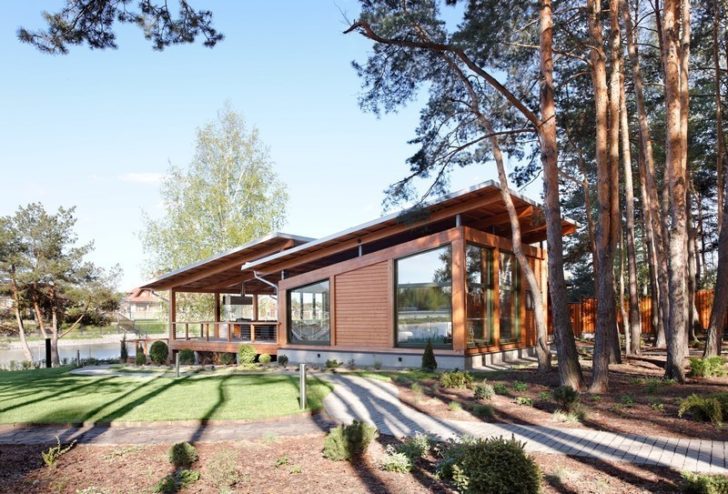 Energooszczędne okna 2026 Nowoczesne energooszczędne okna w drewnianej ramie w domu w stylu skandynawskim