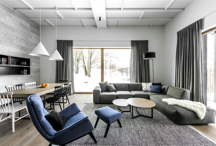 Jasny skandynawski salon Przestronny i jasny salon w stylu skandynawskim z minimalistycznym wystrojem.